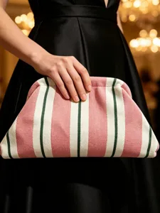 Knitted striped clutch bag for women, elegant pink and green purse for daily and party use.