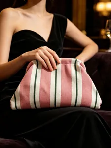 Knitted striped clutch bag for women, stylish pink green white cosmetic storage pouch.