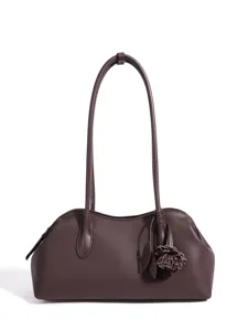 Dunkelbraune Schultertasche aus echtem Leder minimalistische Muschel Handtasche Ansicht