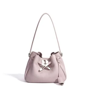 Pink leather bucket bag, elegant shoulder bag with metal lock, stylish minimalist daily purse.