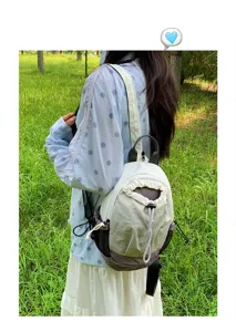 Petit sac à dos de loisir en plein air avec couleur contrastée et cordon de serrage.