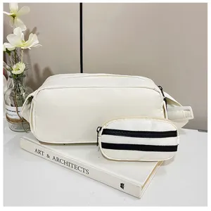 Minimalistische canvas crossbody schoudertas met afneembaar mini tasje voor dagelijks.