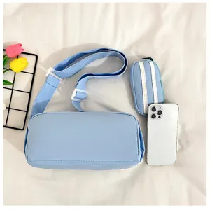 Japanse minimalistische lichtblauwe cilindrische schoudertas set voor dames, casual en veelzijdige stijl.