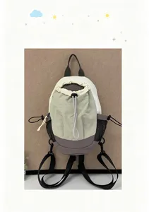 Mini sac à dos bicolore décontracté avec cordon et poches en filet pour voyage.