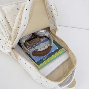 Grazioso zaino scolastico bianco a pois con grande capacità ideale per scuola e viaggi.
