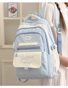 Light blue polka dot student backpack, stylish color block school bag for teenage girls.