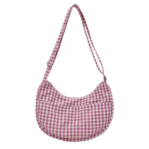 Red and white gingham crescent shoulder bag, stylish casual crossbody bag with adjustable strap.