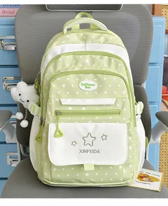 Casual polka dot school backpack for girls, stylish student daypack with multiple pockets.