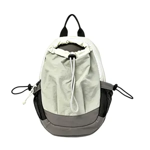 Sac à dos sport outdoor cordon de serrage, sac de voyage stylé colorblock avec poches filet.