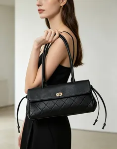 Genuine leather quilted baguette shoulder bag, vintage commuter underarm handbag for women.