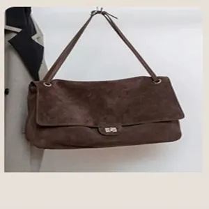 Brown suede shoulder bag for women, retro casual crossbody bag with metal lock detail.