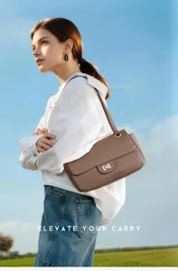 Premium genuine leather shoulder bag for women, stylish underarm commuting bag with lock.