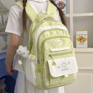Cute polka dot green student backpack, casual school bookbag for girls with star design.
