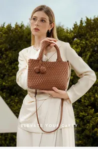 Handmade woven leather handbag for women, stylish brown shoulder tote bag with cute knot charm.
