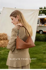Handmade genuine leather woven shoulder bag for women, stylish underarm hobo handbag detail.