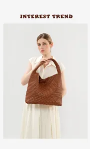 Close-up of a stylish brown woven hobo bag showcasing intricate leather craftsmanship.