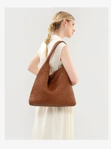 Woven leather shoulder bag for women, large capacity brown hobo tote for casual daily use.