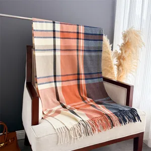 Detailed close-up view of the vintage plaid imitation cashmere warm winter fringed scarf.