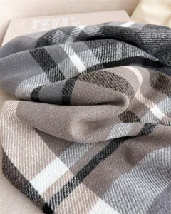 Detailed view of retro plaid scarf, autumn winter warm imitation cashmere tartan shawl.