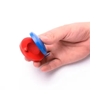 Detailed close-up of a colorful wooden castanet finger instrument, ideal for kids' early music education.