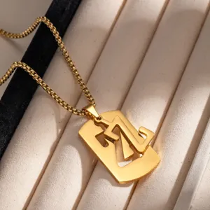 Collana con ciondolo geometrico cavo in acciaio inossidabile dorato gioiello dettaglio
