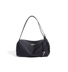 Schwarze Umhängetasche aus echtem Leder, elegante Bento-Tasche für Pendler mit Reißverschluss.