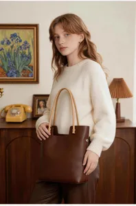 Vintage brown leather tote bag for women, elegant large capacity shoulder handbag.