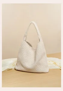 Chic woven underarm shoulder bag, stylish casual handbag for daily wear and beach vacation.