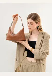 Elegant genuine leather woven shoulder bag for women, classic brown underarm design.