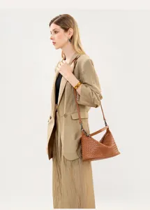 Handmade genuine leather woven shoulder bag for women, stylish underarm crossbody bag.
