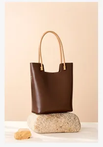 Brown leather tote bag with tan handles, large capacity retro vintage shoulder handbag.