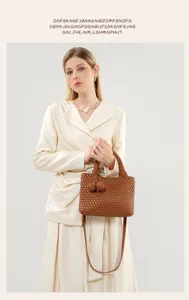 Close-up detail of the elegant woven leather shoulder bag featuring stylish knot accents.