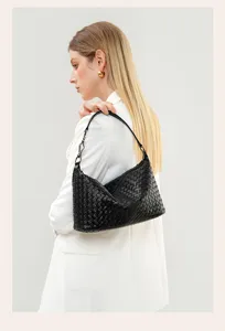Handmade genuine leather woven shoulder bag, elegant underarm style, chic women's handbag.