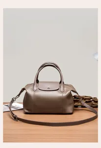Genuine leather pillow shoulder bag for women, large capacity stylish tote and crossbody handbag.