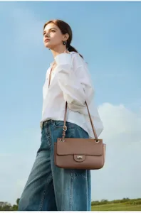 Stylish genuine leather shoulder bag for women, premium brown commuter casual handbag.