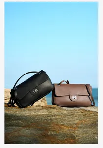 Detailed view of genuine leather shoulder crossbody bag, premium cowhide, stylish commute style.