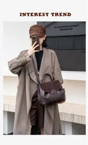 Stylish genuine leather shoulder bag for women, commuter top-handle handbag with suede flap.