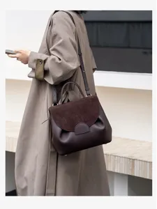 Stylish brown leather commuter shoulder bag with large capacity and elegant daily design.