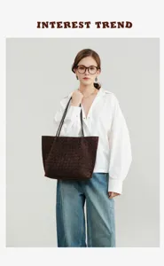 Brown suede woven shoulder tote bag, large capacity casual handbag detail shot for women.
