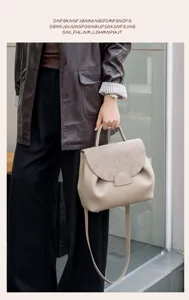 Stylish women's leather commute handbag, large capacity elegant shoulder crossbody bag.