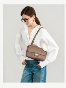 Leather shoulder bag for women, top layer cowhide commute underarm bag, brown chic design.