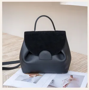 Black genuine leather handbag, suede flap detail, top handle and crossbody bag, commute style detail.