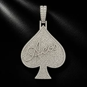 Close-up detail of full rhinestone paved spade Aces pendant, hip-hop alloy men's trendy necklace.
