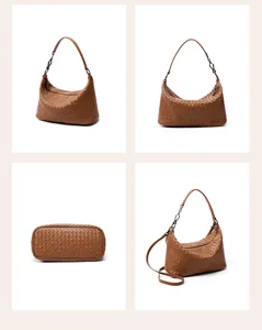 Brown leather woven handbag detail view showing exquisite craftsmanship and metallic link hardware.