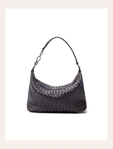 Detailed view of the dark brown woven leather shoulder bag showing exquisite craftsmanship.