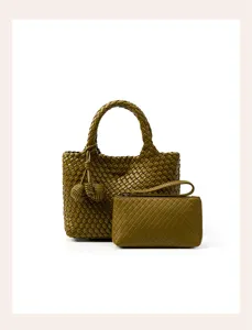 Detailed view of olive green woven leather tote bag with matching wristlet pouch.