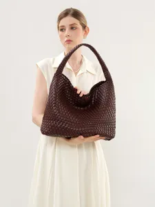 Handmade woven leather hobo bag, stylish brown shoulder tote bag for women daily use.