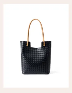 Black woven leather tote bag for women, stylish large capacity shoulder bag with brown handles.