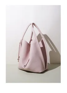 Minimalist pink bucket bag for women, large capacity pebbled leather handbag for daily work.