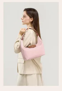 Pink nylon shoulder bag for women, classic flap underarm handbag, casual commuter daily purse.